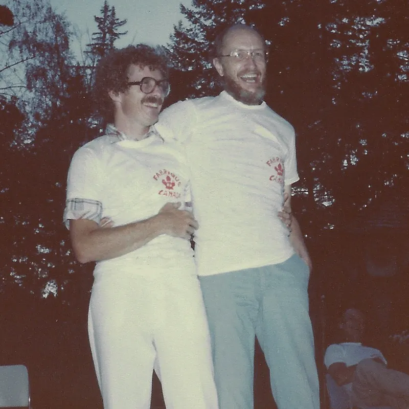A man and woman standing next to each other.